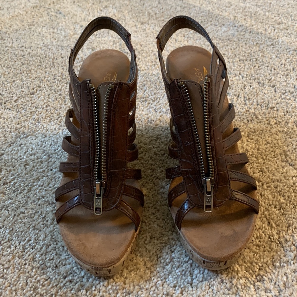 Brown AEROSOLES wedged sandals.